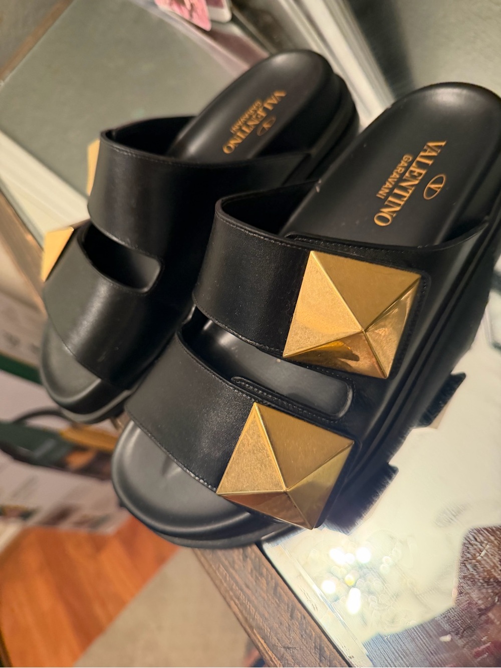 Valentino Black Leather Slide Sandals with Gold Pyramid Studs